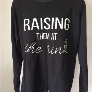 Raising them in the rink sweater